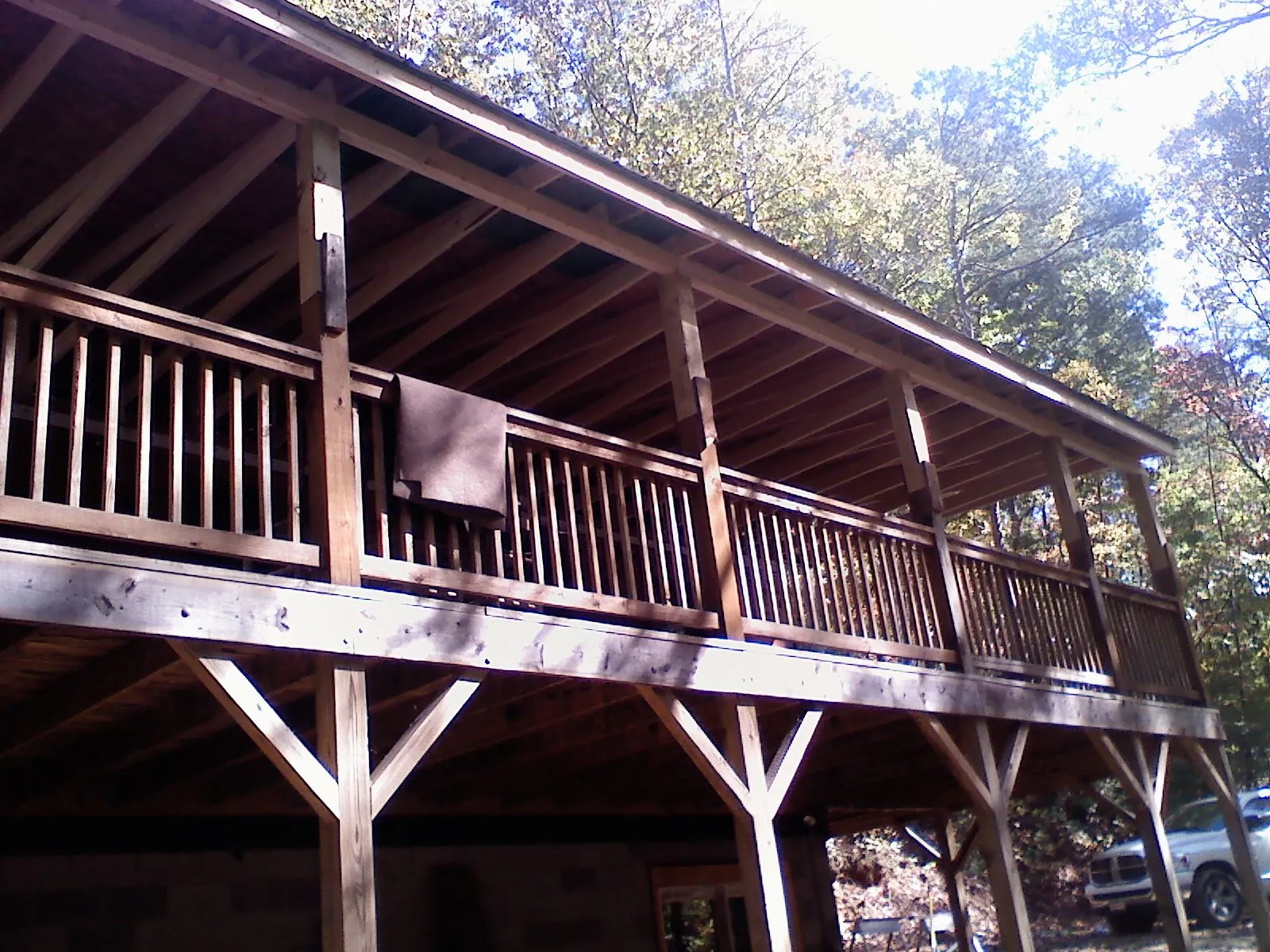 Timber framing under a new elevated porch and deck — Roof Leak Repair in Flushing by Roofing Brothers